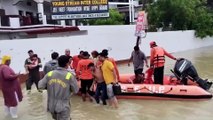 Indian firefighters come to rescue of locals trapped in flooded houses