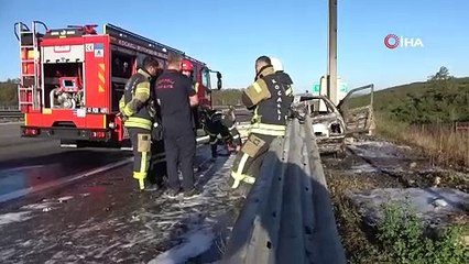 Bariyerin içinden geçen otomobil alev aldı: Ölümden döndüler