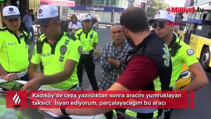 Kadıköy'de ceza yazılan taksici aracını yumrukladı