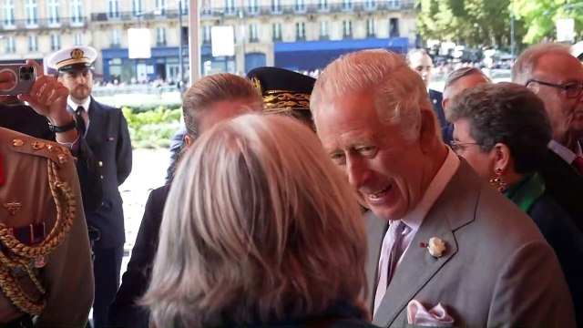Sunshine and showers for King Charles aboard HMS Iron Duke