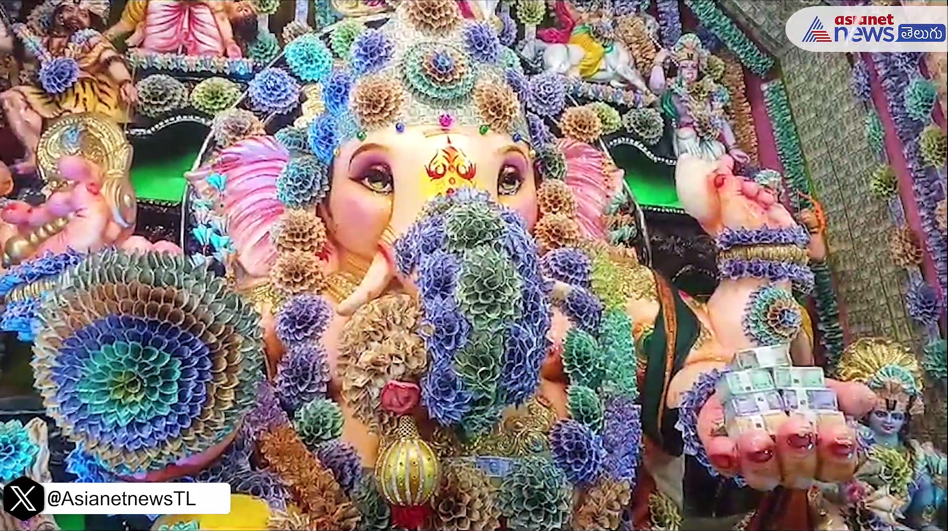 మంగళగిరిలో గణపతిని డబ్బులతో అలంకరించిన వ్యాపారస్తులు