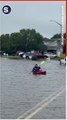 Man Kayaks Down Flooded Road After Storm Ophelia Hits North Carolina