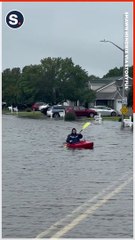 Man Kayaks Down Flooded Road After Storm Ophelia Hits North Carolina