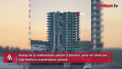 İş makinesiyle yıkılan binaların yerle bir olma anları kamerada