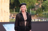 Charlize Theron believes people are 'scared' to talk about the challenges of motherhood