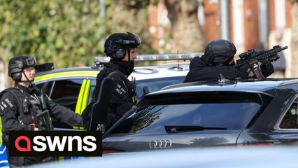 Armed police surround property after man barricades himself inside during ongoing siege in Birmingham