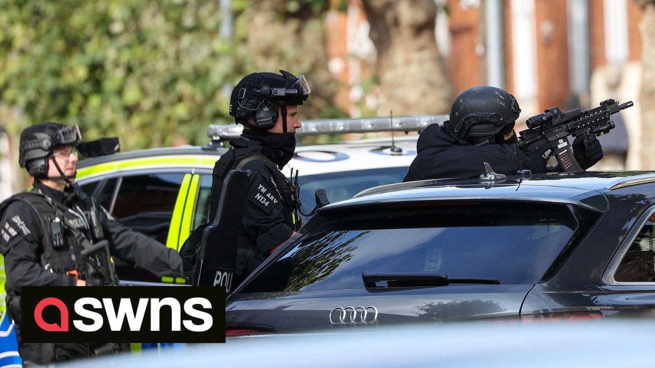 Armed police surround property after man barric...