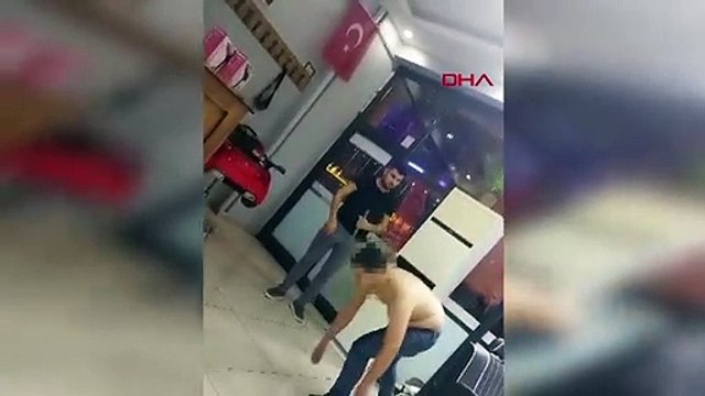 Berberin çıraklarına şınav çektirip süründürdüğü görüntüler tepki topladı