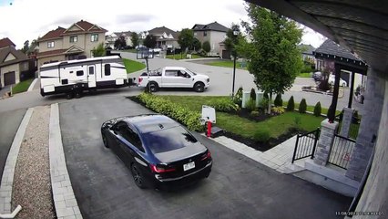 Trailer Scrapes Past Basketball Hoop