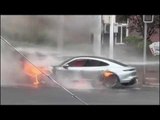 £200k Porsche EV bursts into flames on street during rush hour as firefighters battle blaze