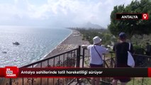 Antalya sahillerinde tatil hareketliliği sürüyor