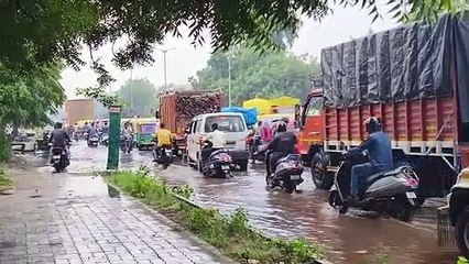 VIDEO.... अहमदाबाद: उमसभरी गर्मी के बीच कई इलाकों में बारिश से राहत