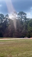 Long-Lived Tall Dust Devil In The Yard