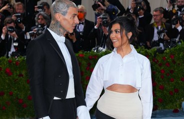 Kourtney Kardashian and Travis Barker will wait to meet their baby before deciding on a name