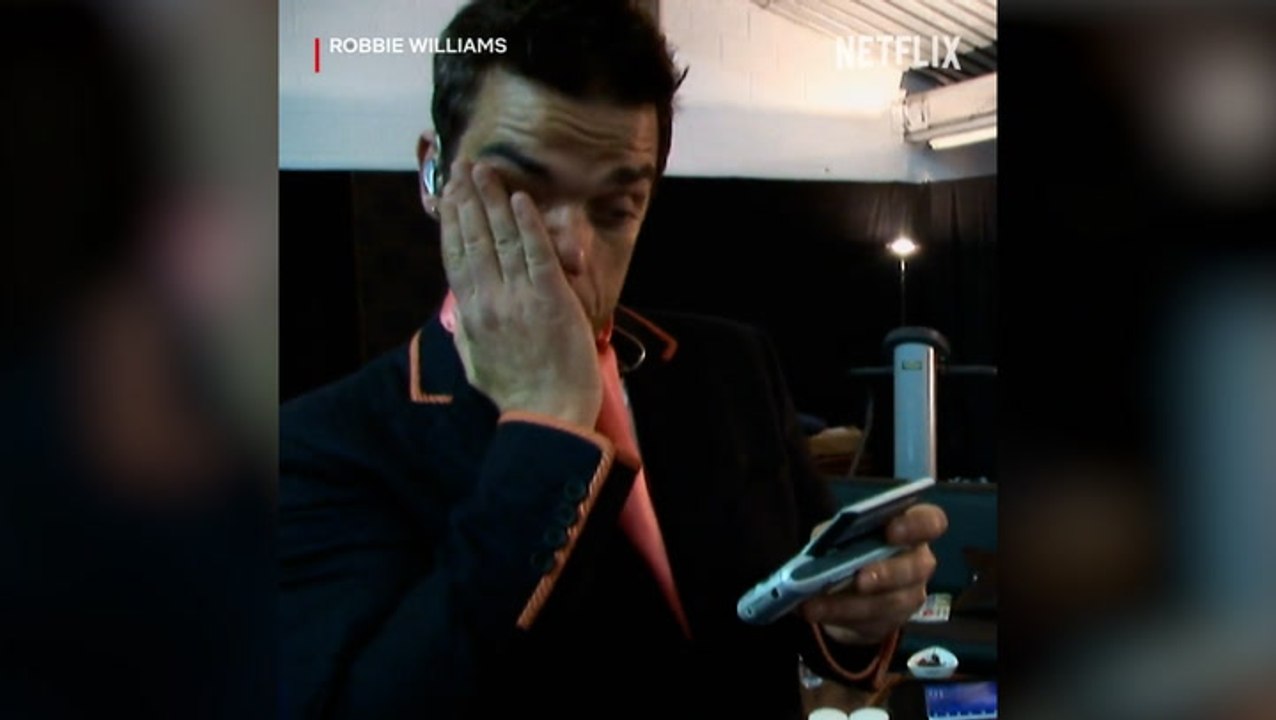 Robbie Williams breaks down in tears backstage in unseen footage in new Netflix documentary