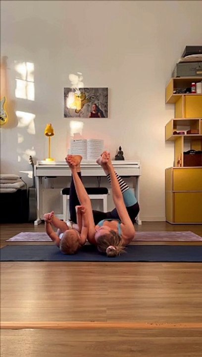 Baby Does Yoga With Mom