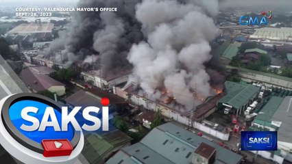 Sunog sa bodega sa Valenzuela City, halos isa't kalahating araw nang inaapula | Saksi