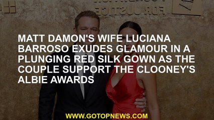 Matt Damon's wife Luciana Barroso exudes glamour in a plunging red silk gown as the couple support t