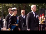 Princess Anne walks shoulder-to-shoulder with her brothers