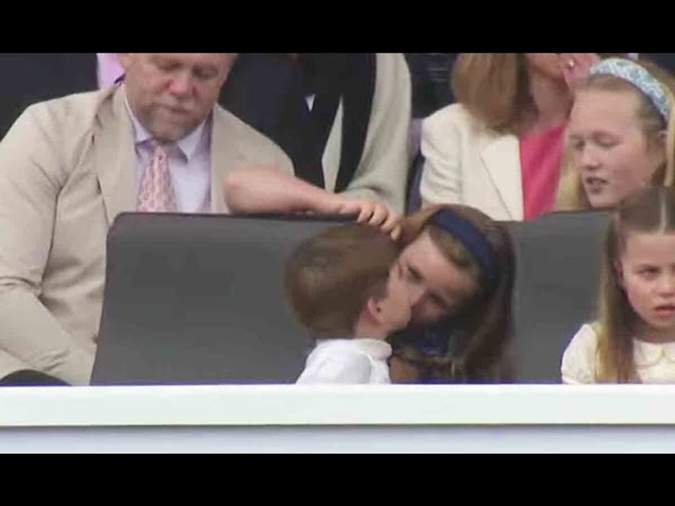 Prince Louis has cousin Mia in stitches as he enthusiastically kisses her on the nose