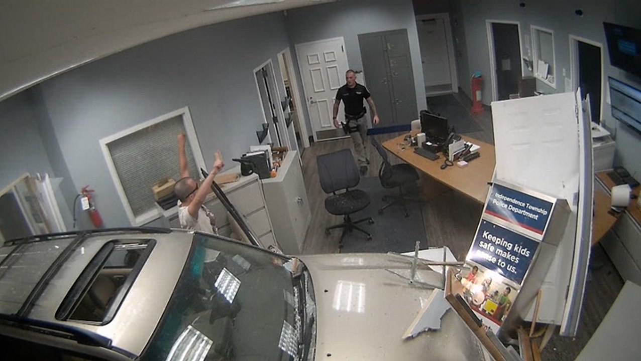 Moment man deliberately crashes car into police station in New Jersey
