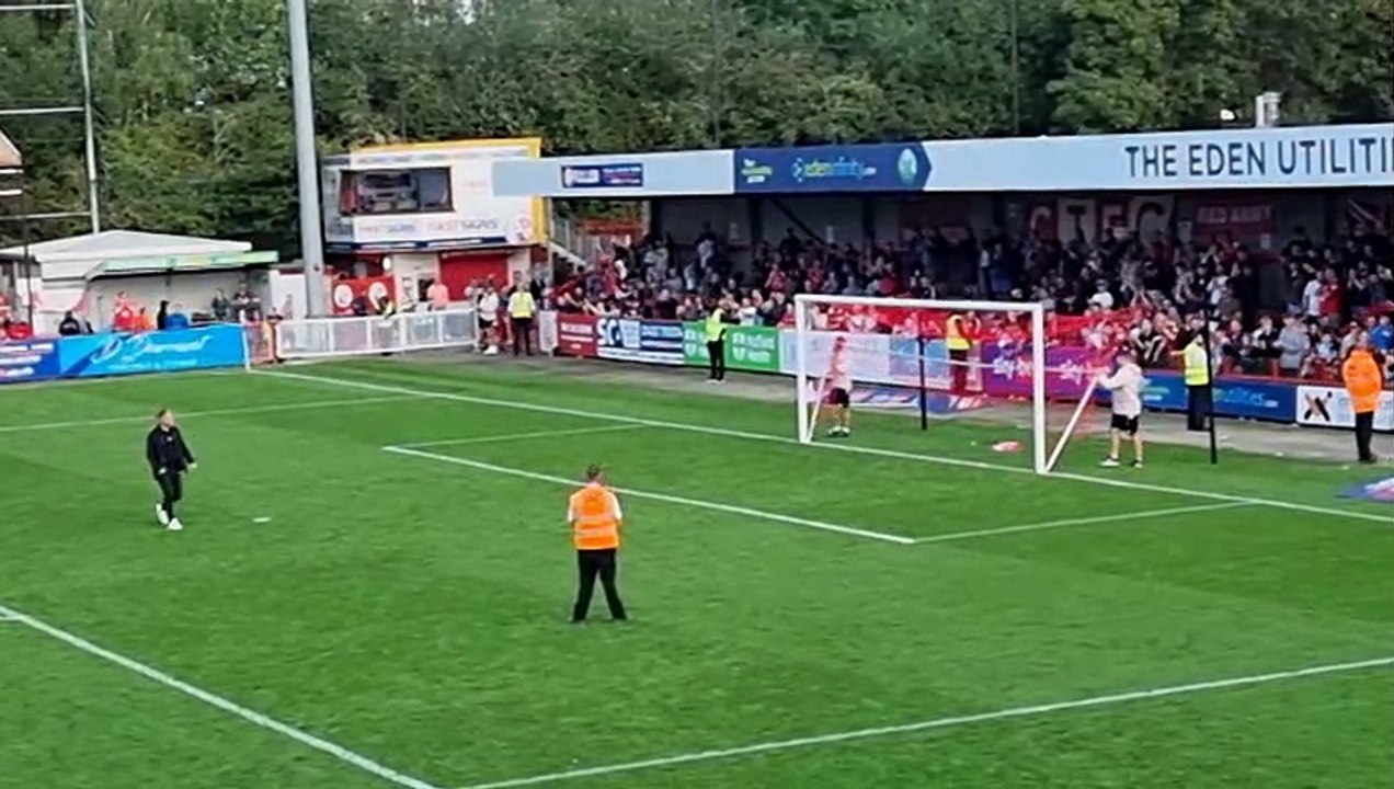 Crawley Town boss Scott Lindsey celebrates with fans after Sutton United win