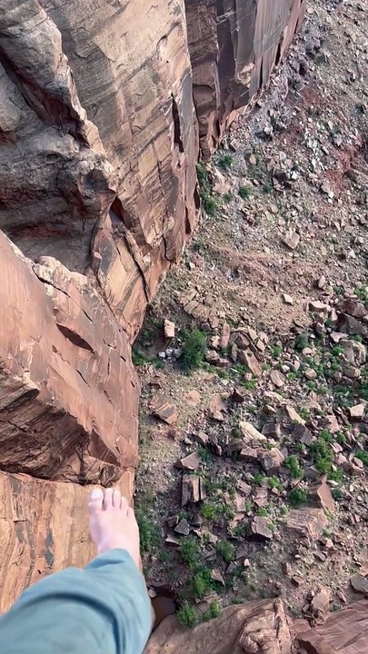 Rope Swing Through The Canyon