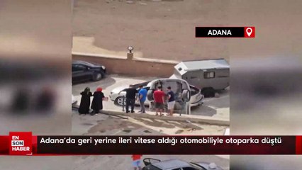 Adana'da geri yerine ileri vitese aldığı otomobiliyle otoparka düştü