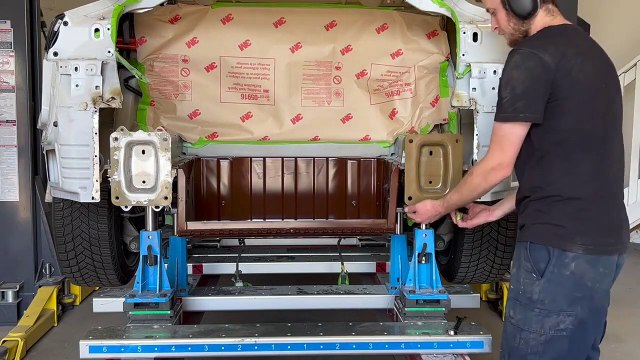 Part 2 Structural Collision Repair Process on rear end of Tesla Model 3 on Celette bench