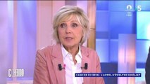 Evelyne Dheliat retire sa perruque à l’antenne : sa décision forte de révéler sa maladie après de longs mois passés à le cacher !