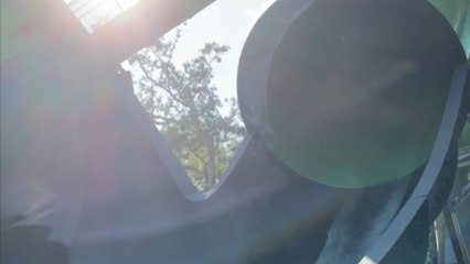 'He fell out!' - Man defeated by a 'wave' while tubing down a water slide!