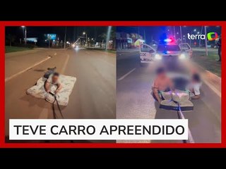 Homem é levado para delegacia após 'surfar' em colchão por ruas de cidade no MT