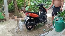 cleaning his 