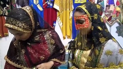 İranlı kadın Türk bayrağını kravat ve cüzdanlara işledi