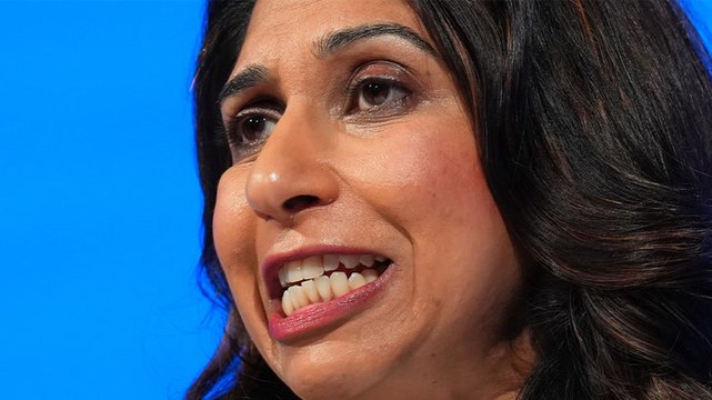 Suella Braverman reacts to photo of herself standing on guide dog at Tory party conference