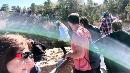 Tourists Hop Over Railing at Grand Canyon