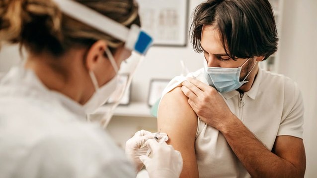 Can I Drink Alcohol After a COVID-19 Booster and Vaccine?