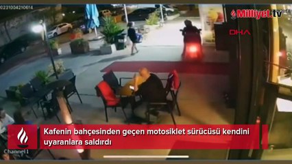 Kafenin bahçesinden motosikletle geçti; uyaranlara tekme tokat saldırdı