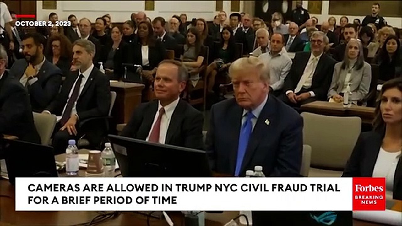 BREAKING_NEWS__Camera_Briefly_Gets_Into_Trump_Trial_Courtroom%2C_Judge_Takes_Off_Glasses_And_Smiles(360p)