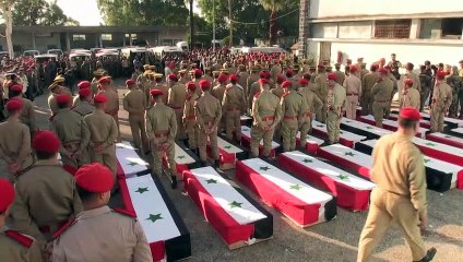 Síria enterra seus mortos após ataque contra academia militar