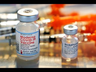 Japan considers bringing forward COVID booster shots for all: Kishida