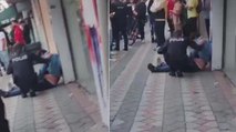 Sokakta yürüyen kadının fotoğrafını çekerken yakalandı; darbedildi