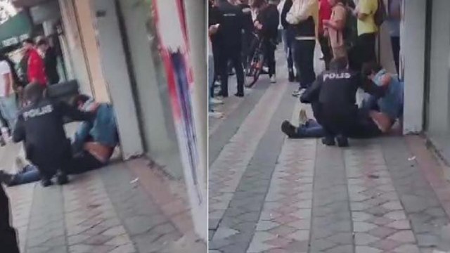 Sokakta yürüyen kadının fotoğrafını çekerken yakalandı; darbedildi