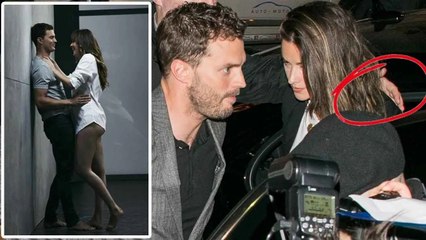 Jamie Dornan gestures super cute to Amelia Warner as she comes to the set of 'Fifty Shades'
