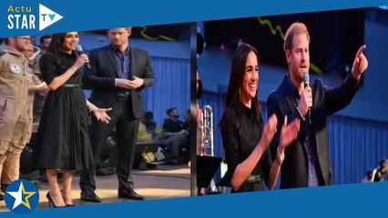 Meghan Markle avec Harry aux Invictus Games 2023  découvrez le mini prix de sa robe Banana Republic