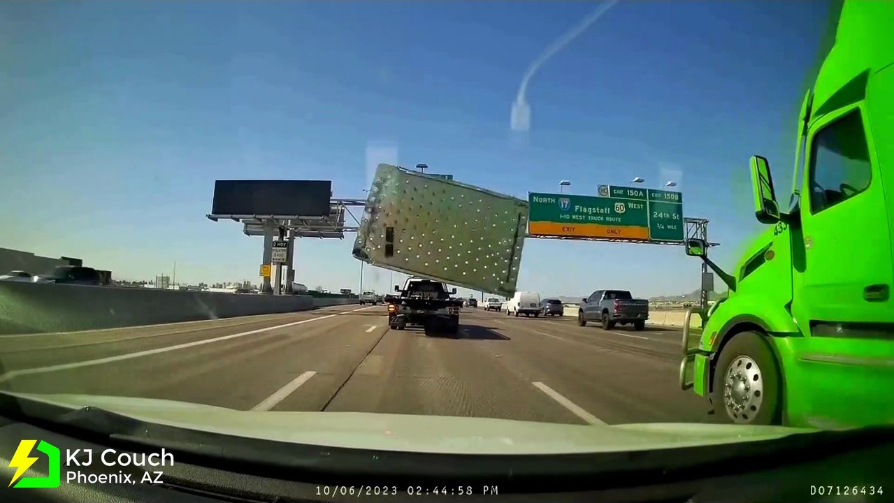 Flying Metal Sheet Smashes Car Windscreen | Dashcam Ltd