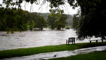 Benches submerged by flooding Spey at Aberlour