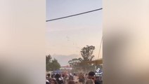 Hamas paragliders descend on Israel music festival as people flee massacre