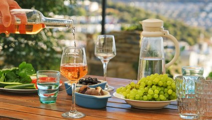 Ordering Wine for the Table? These 13 Bottles Pair With Any Entree