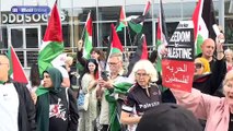Moment 100 Pro-Palestinian demonstrators are confronted outside Labour conference by lone Israel supporter who tells them 'you should be ashamed - they're murdering people'